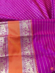 Classy and vintage-inspired Kanjivaram semi-soft silk saree